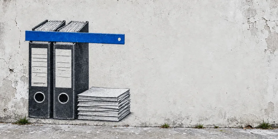 Conceptual mural of archive binders aligned with a blue straightedge.